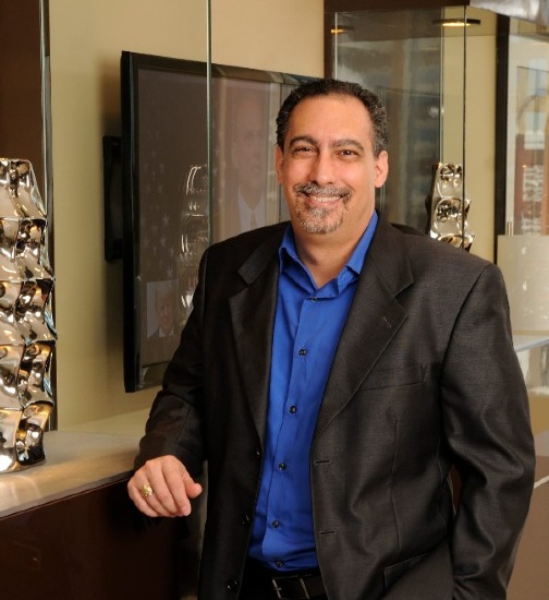 Smiling TAB Member showing his business