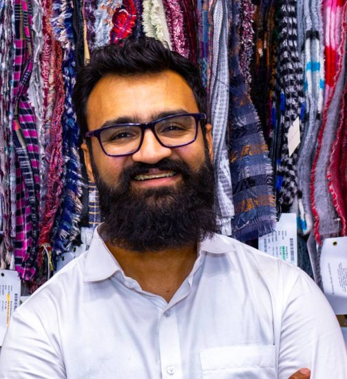 Smiling TAB Member Prashant Maheshwari is showing his store
